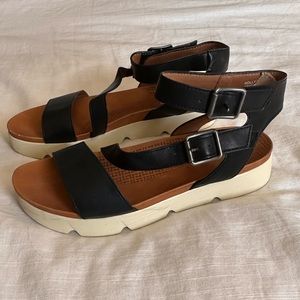 Black ankle strap sandals with arch support